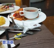 昆仑饭店一层的普洱茶名称是什么？