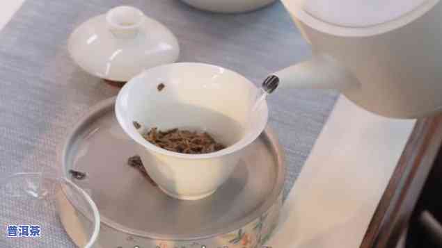 普洱茶怎么取出茶杯套袋视频，学会怎样从茶杯中取出普洱茶的套袋，一看就会的视频教程！